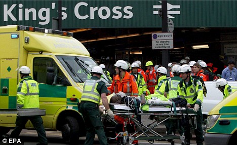 Emergency services personnel in front of King Cross