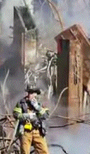 Fireman next to cut column